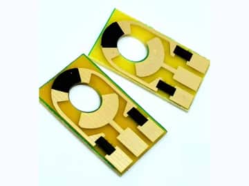 View 3: Pair of carbon contact boards with exposed conductor pads and printed black contact zones