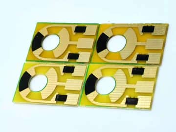 View 4: Four carbon contact PCB samples showing repeated circular contact geometry and terminal regions