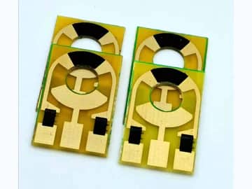 View 5: Carbon contact PCB set with alternate circular artwork and multiple exposed conductor pads