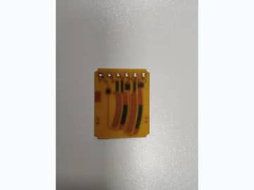 View 2: Carbon ink jumper PCB showing printed crossover paths and copper interfaces on a compact board