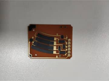 View 3: Carbon ink jumper PCB with multiple curved black jumpers between conductor regions