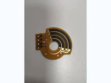 View 4: Circular carbon ink jumper PCB showing black printed bridge paths and perimeter contacts