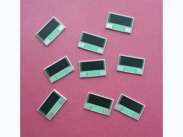 View 4: Eight compact thick film power resistors arranged to show rectangular ceramic formats and terminal ends