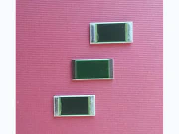 View 5: Three thick film power resistors aligned vertically with broad dark films and metal-colored terminations