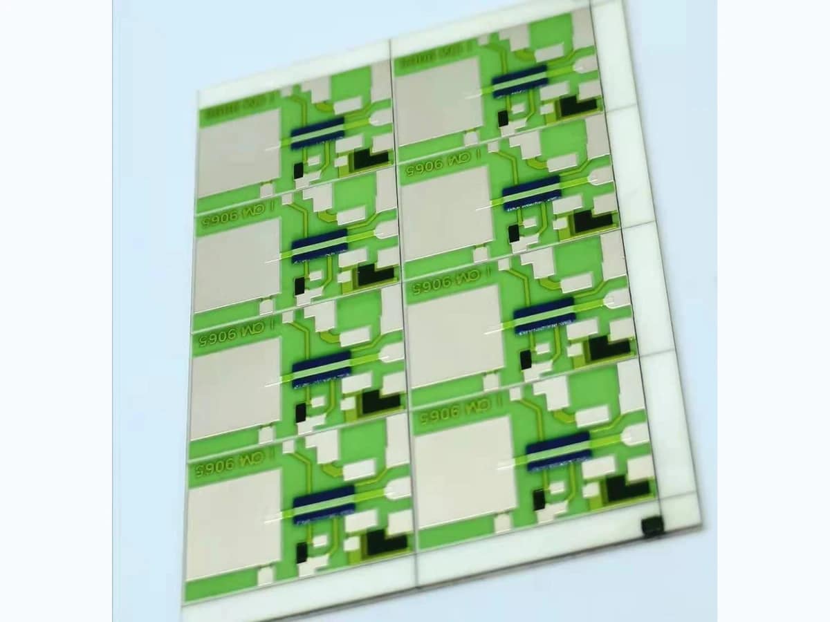 Panel of green ceramic thick film resistor arrays with printed conductors, resistor elements, and large terminal areas