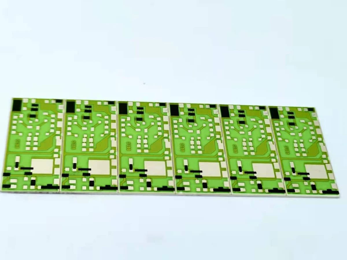 Product photograph of a ceramic circuit with several printed thick film resistor bodies and conductor terminations