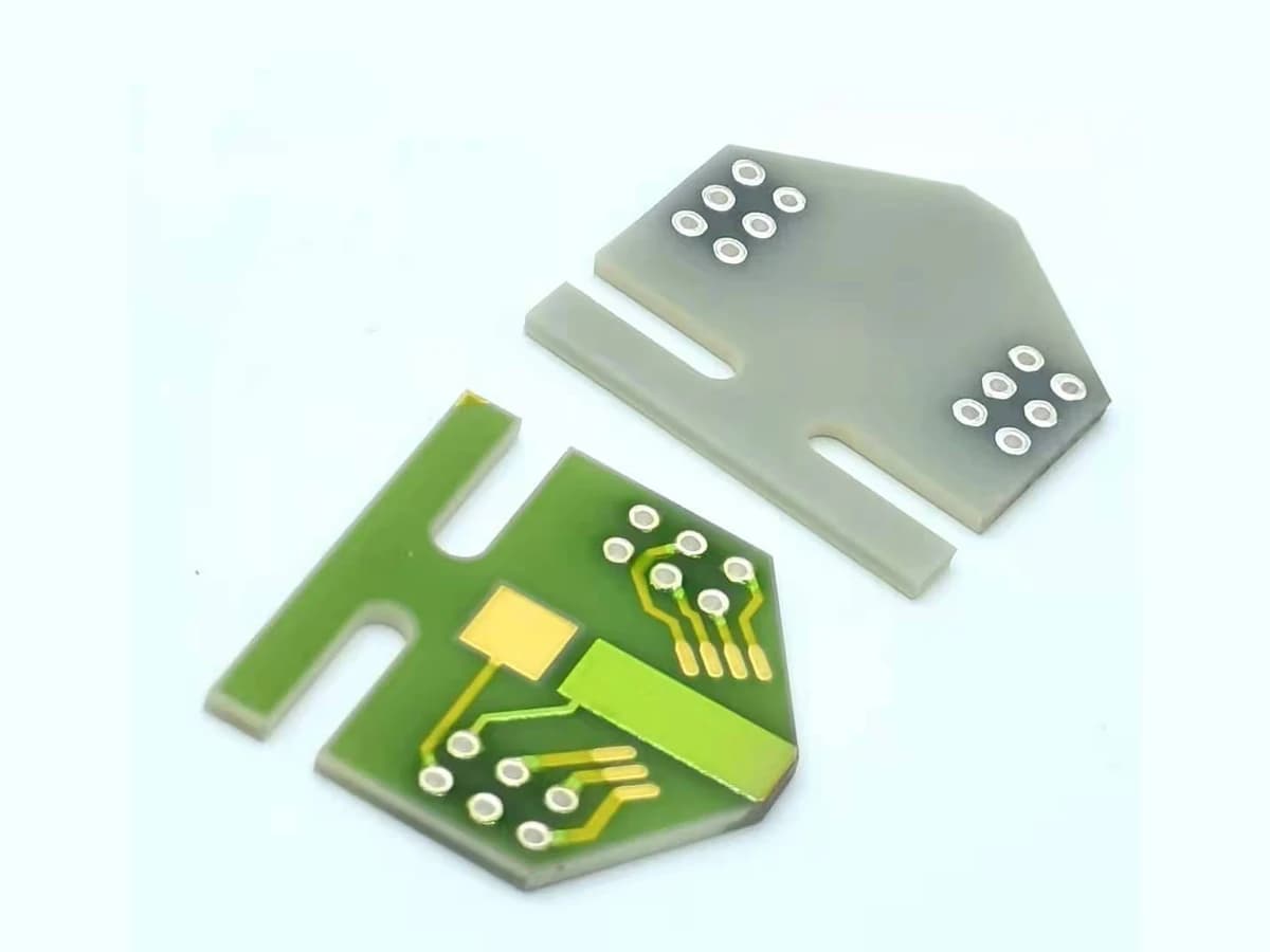 Real product photograph comparing front and reverse surfaces of a ceramic circuit with metallized holes