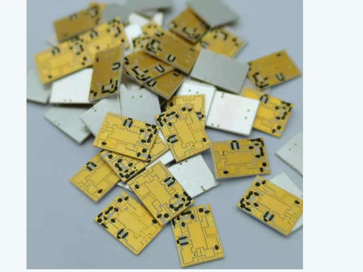 Verified batch view of thick film filter circuit samples with patterned and plain ceramic faces visible