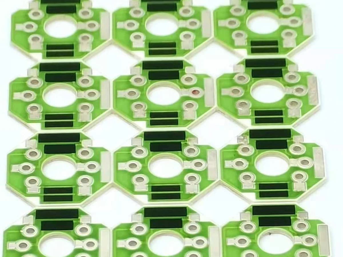 Real ceramic thick film voltage-divider product detail with printed resistive and conductor features