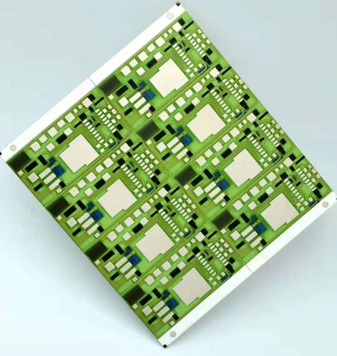 Company thick film ceramic sample panel with repeated green patterned regions and white ceramic borders