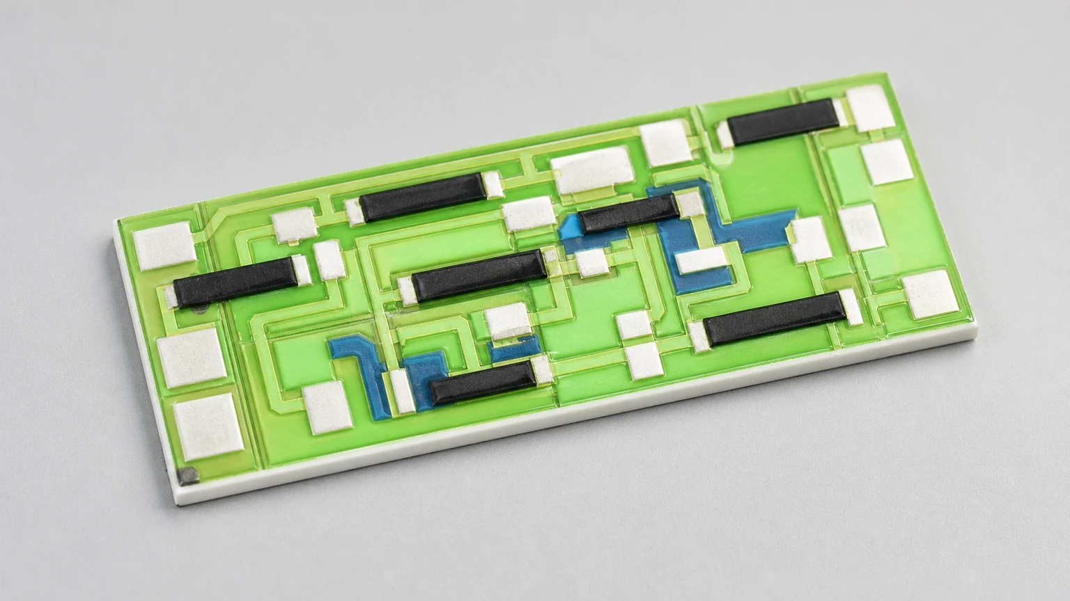 Application illustration of a generic alumina thick film resistor network with printed routes and resistor features