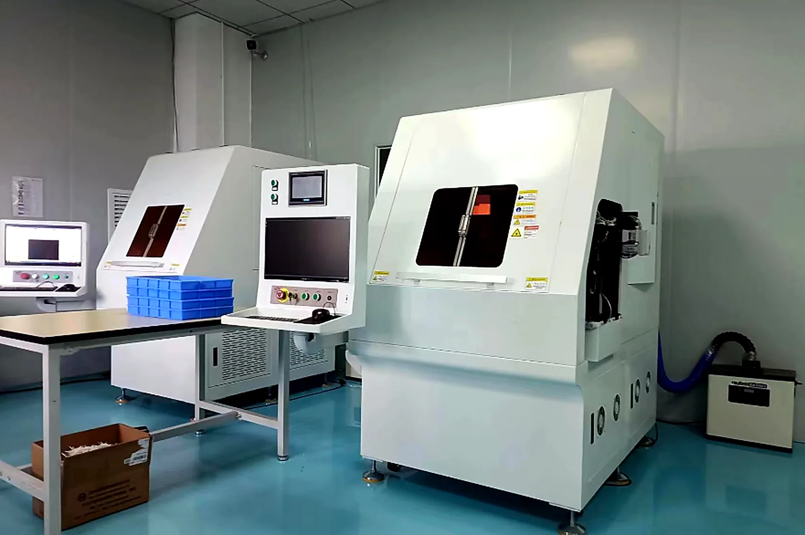 Company-supplied photograph of enclosed equipment in the controlled sintering workshop