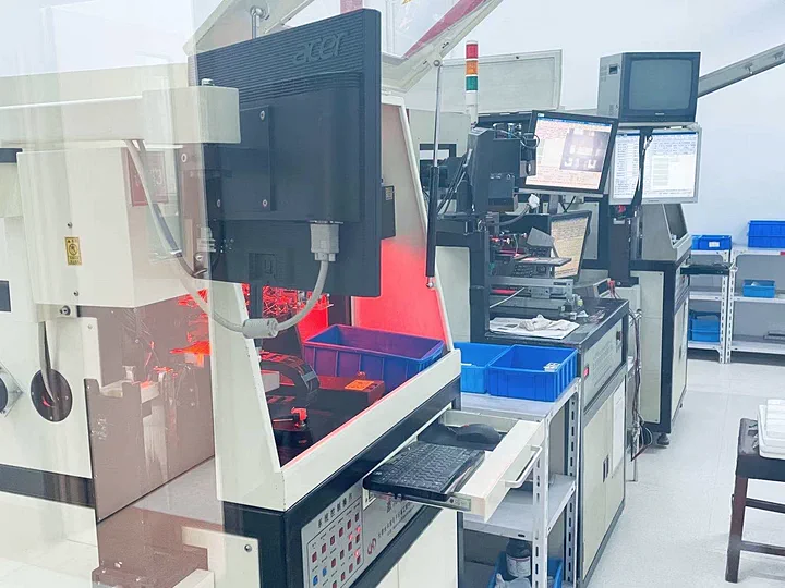 Enclosed laser-processing equipment in the company workshop