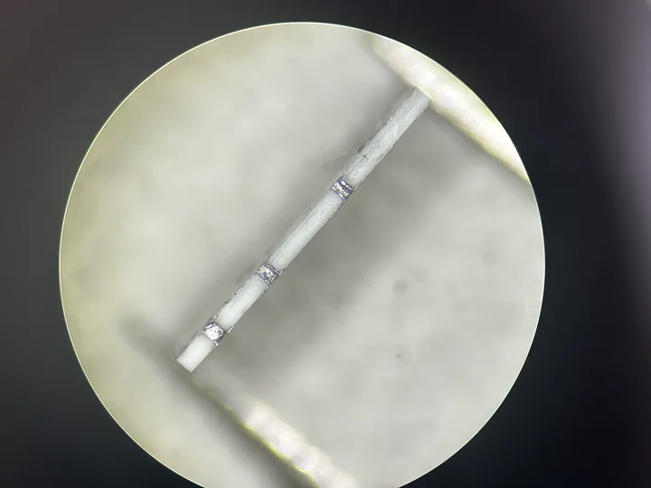 Microscope view of a circuit detail during inspection