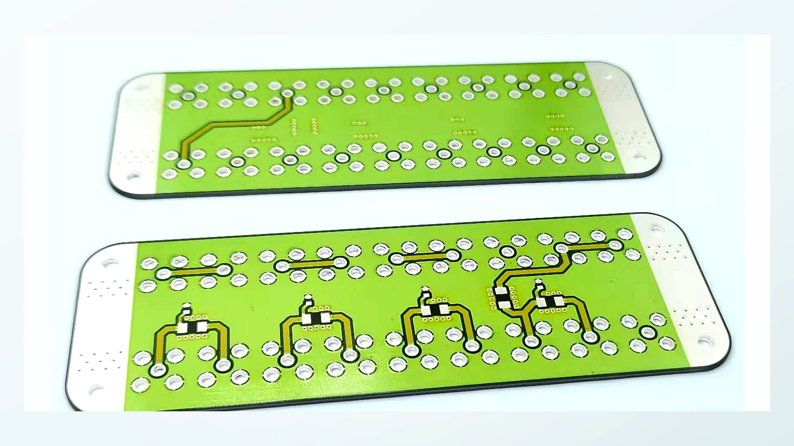 Paired real product view showing different printed geometry on the two ceramic faces