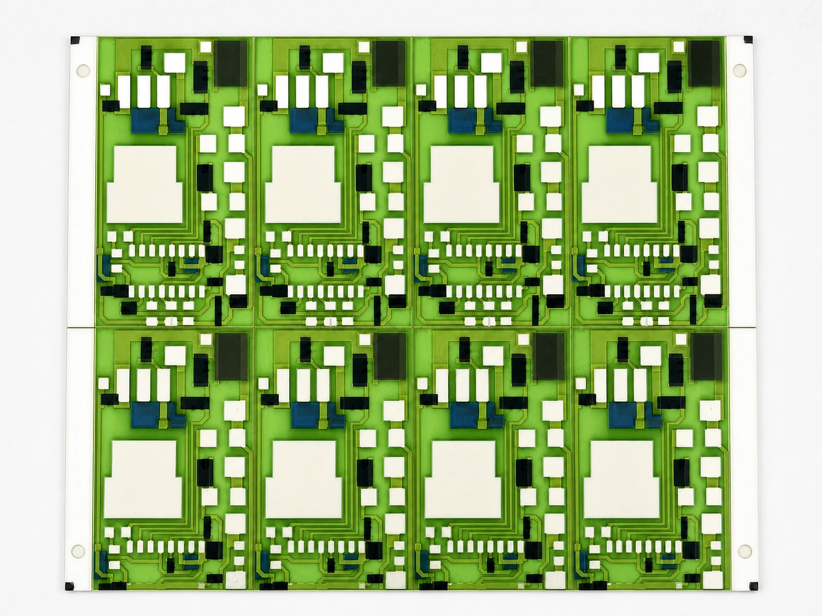 Conductor routing, resistor elements and connection pads on a green-glazed ceramic panel.