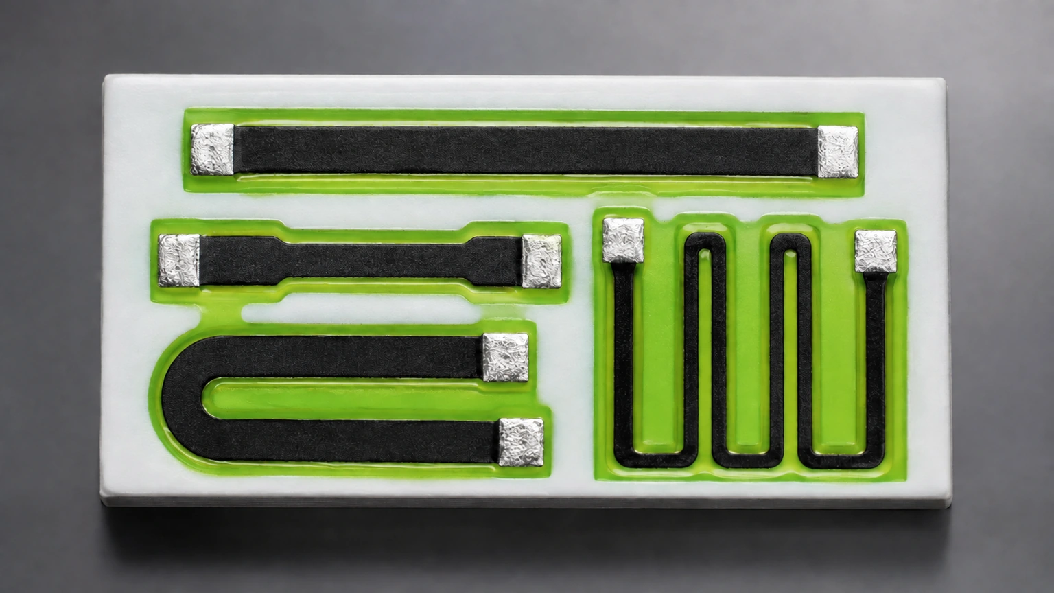 High-resolution industrial engineering scene showing resistor geometry coupon in a clean thick-film ceramic circuit context.