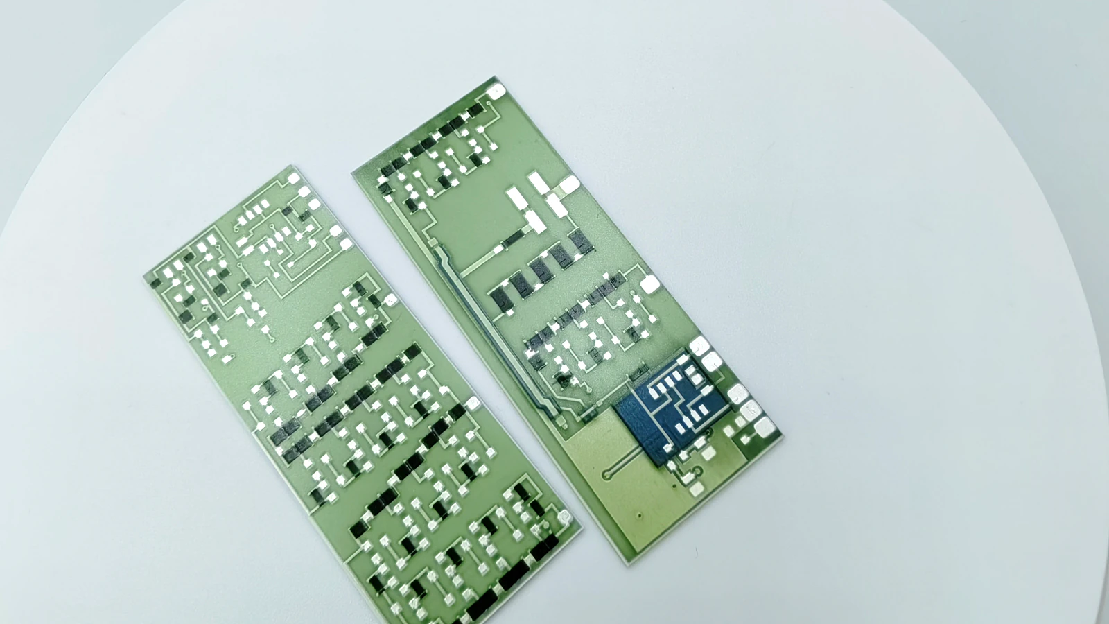 Real product view showing two rectangular high temperature thick film circuit forms with different visible layouts