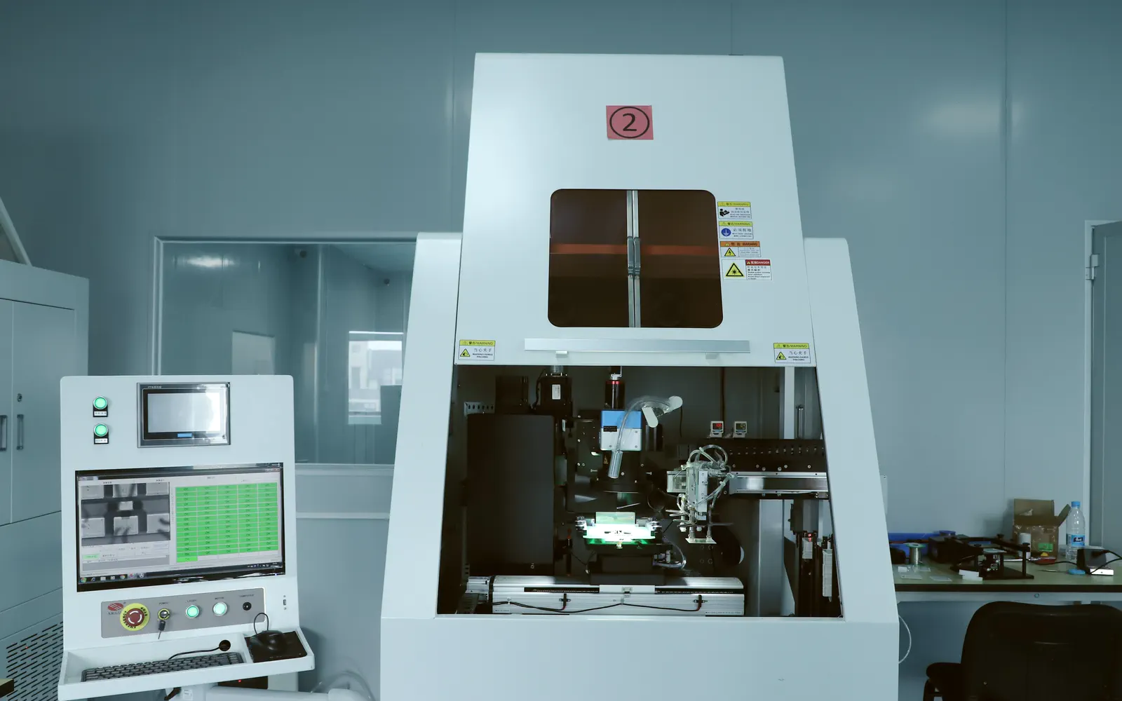 Real laser trimming machine and resistance measurement console in the Chipsimple workshop