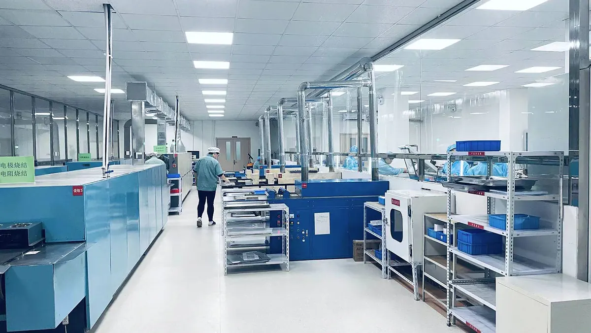 Chipsimple thick film circuit production floor with operators and screen-printing workstations