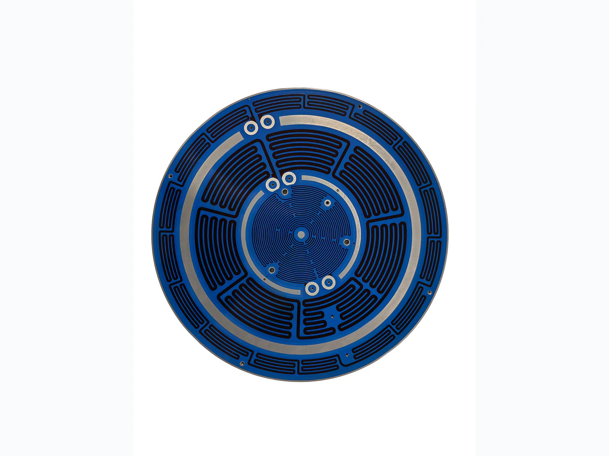 Supplied alternate-angle photograph of a circular aluminum substrate thick film heater