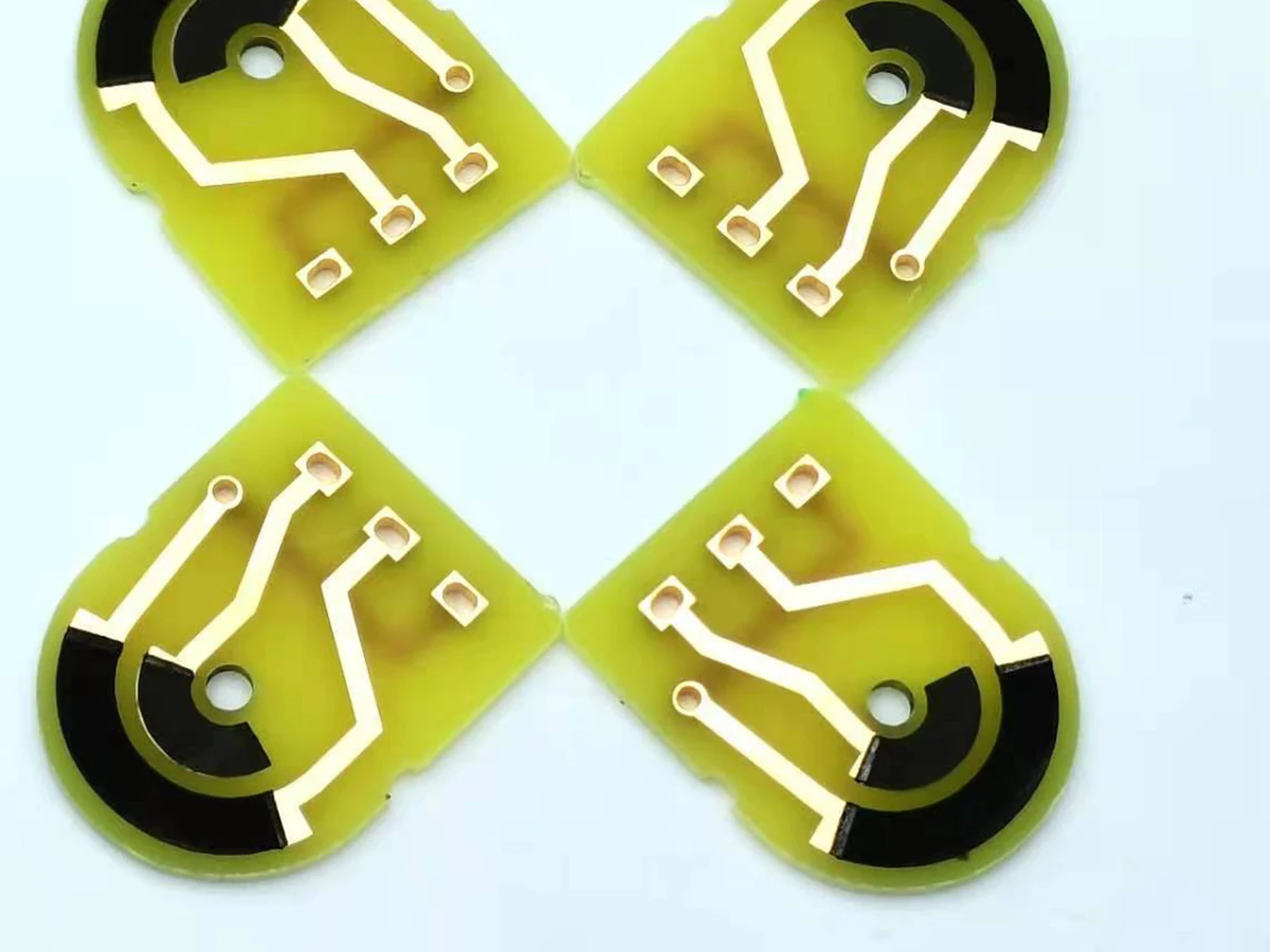 Controlled detail crop of a verified carbon film potentiometer PCB showing the printed arc track and terminals