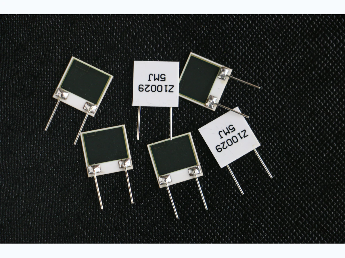 Real thick film resistor-network samples representing printed passive integration on ceramic