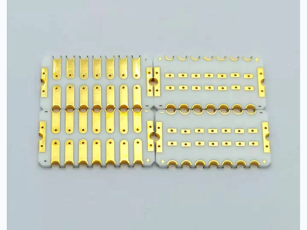 Real double-sided ceramic circuit showing metallized surfaces and via connections