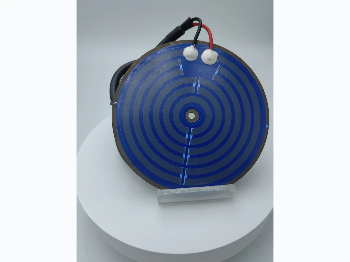 Second round kettle heater layout showing divided concentric paths and visible terminal assembly