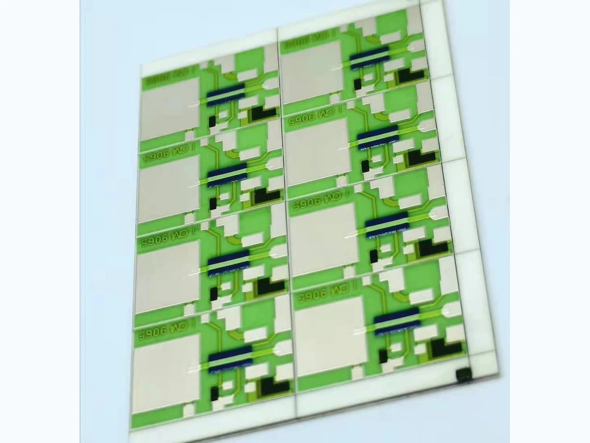 Panel of green ceramic thick film resistor arrays with printed conductors, resistor elements, and large terminal areas