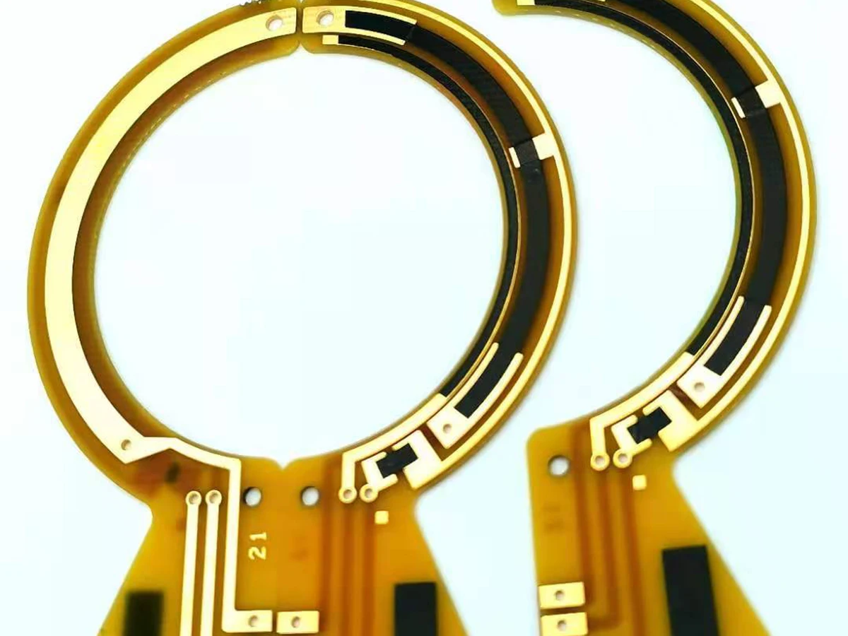 Controlled detail crop of a verified carbon film sensor PCB showing several printed tracks and terminals