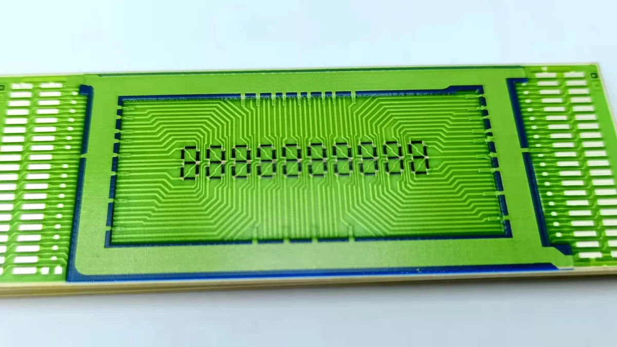 Low-angle product view showing the terminal-pad areas and thin rigid edge