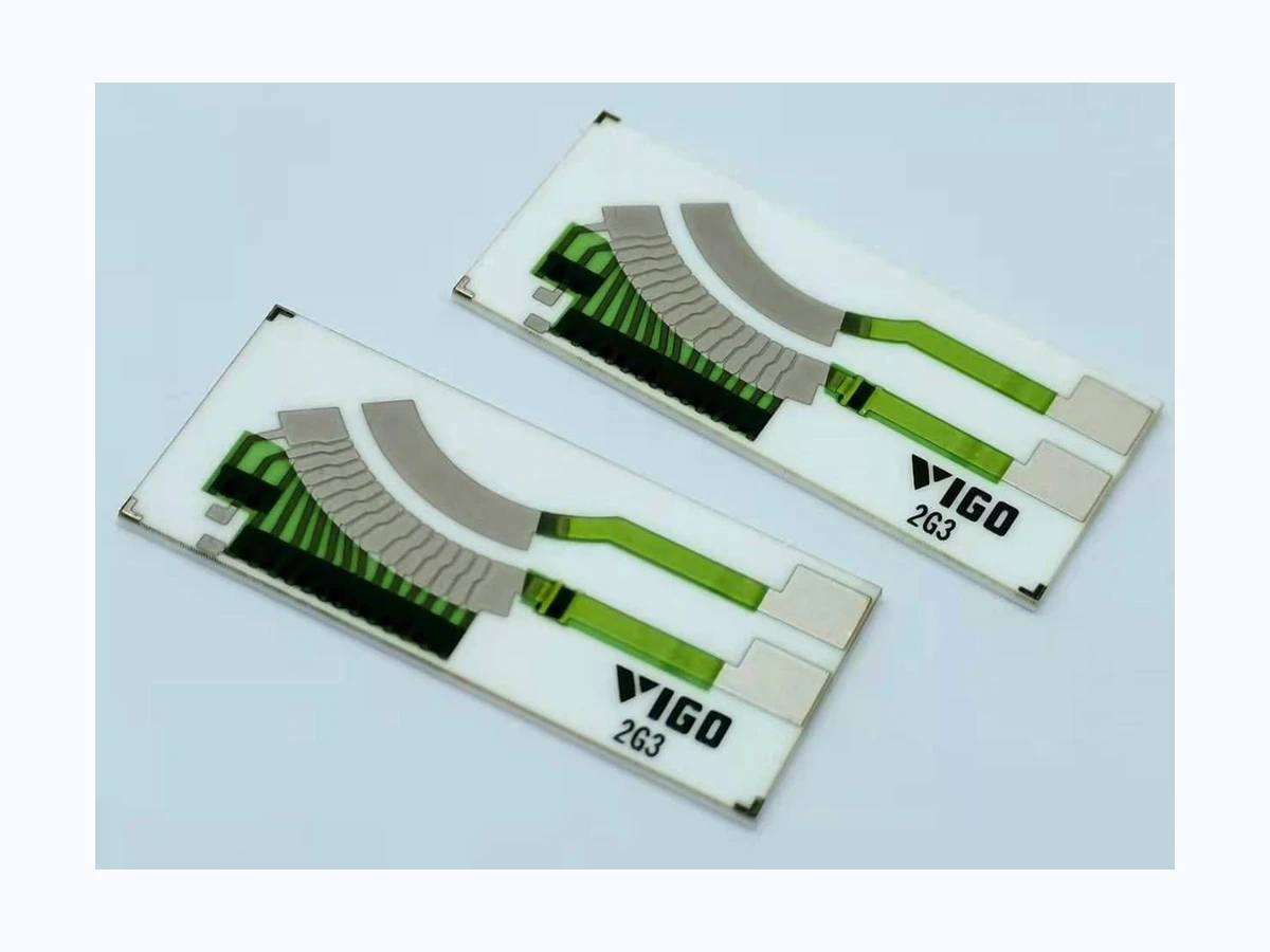 Two complete oil level sensor resistor cards with arc tracks and terminal pads