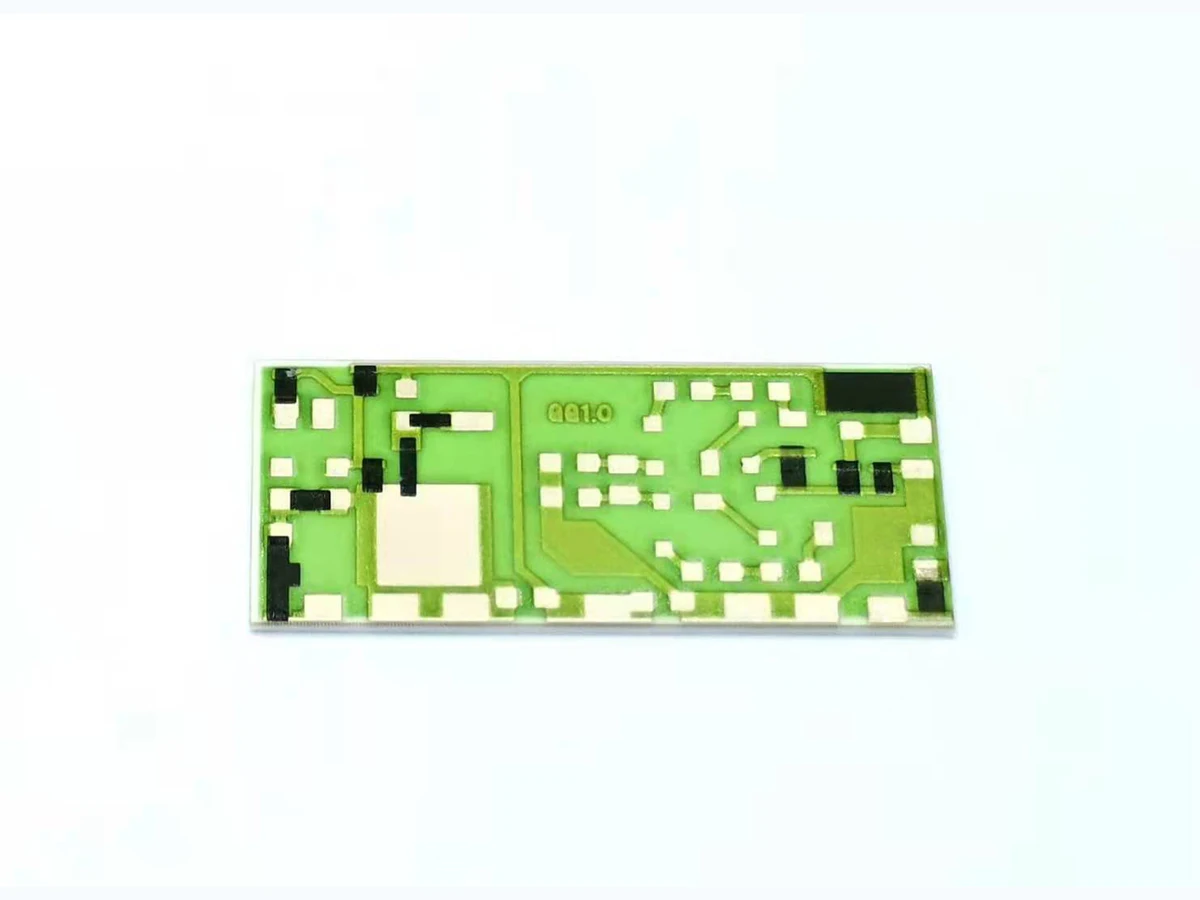 Real printed thick film resistor samples with visible conductor terminations and resistor geometry