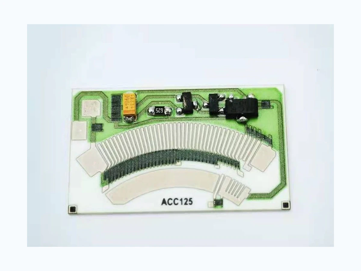 Complete rotary position sensor resistor card with populated components and printed arc tracks