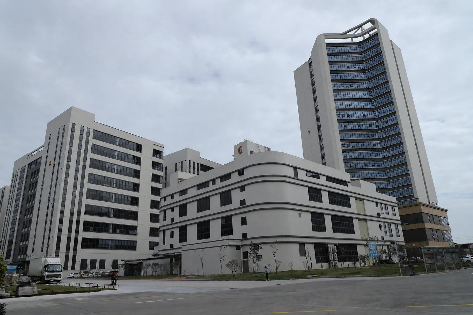 Exterior photograph of the Dongguan industrial park containing the production site